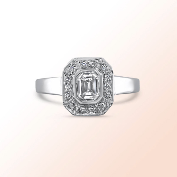 18k.w. Emerald Cut Diamond Engagement Ring 0.73Ct. Color: G Clarity: VS2
