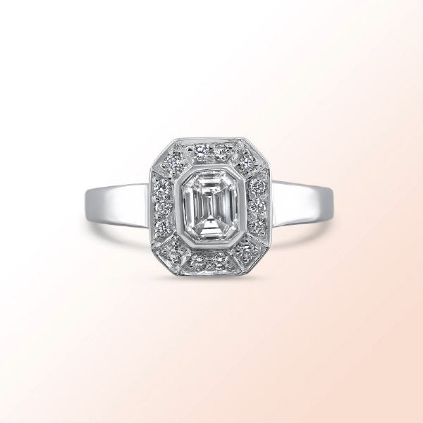 18k.w. Emerald Cut Diamond Engagement Ring 0.73Ct. Color: G Clarity: VS2