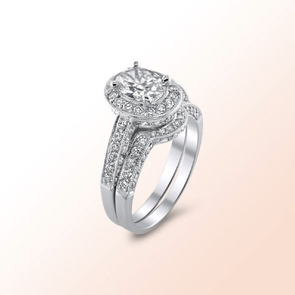 18k.w. Oval diamond wedding set 2.16Ct.