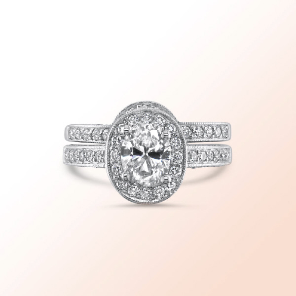 18k.w. Oval diamond wedding set 2.16Ct.