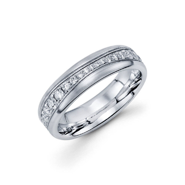 5.5mm 14k ladie's eternity band is set with 46 graduate style diamonds in a pave setting in between milgrain sides. Total diamond carat weight is approximately 0.41ct.