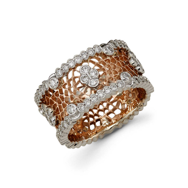 11m 18k two tone ladie's wedding band features a rose gold center resembling a honeycomb along with white gold patterns rested on top as well as on the sides which contain diamonds a pave setting. The ring consists of 90 ideal diamonds accumulating to a