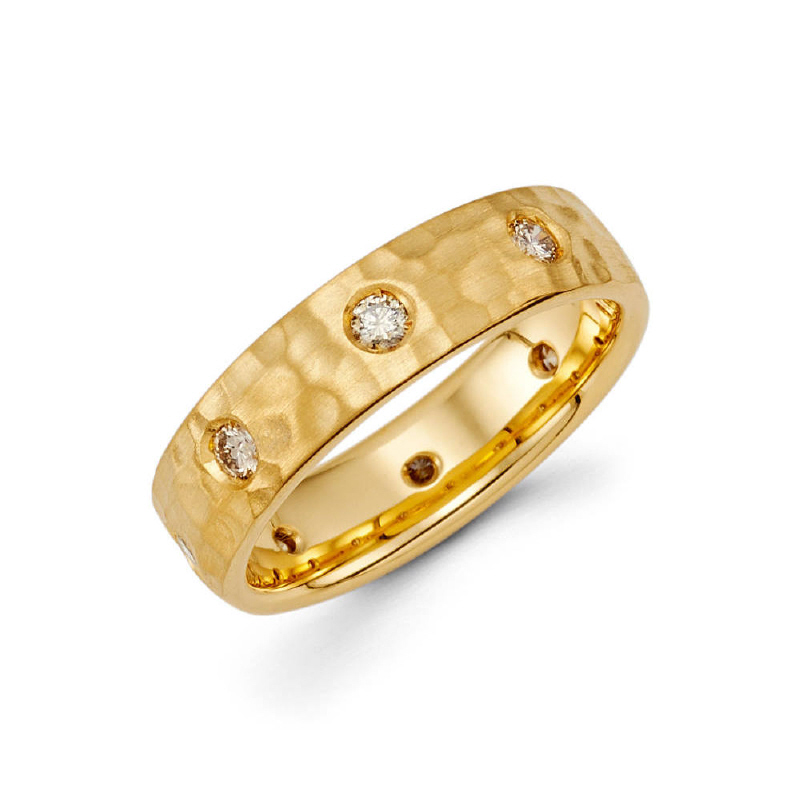 This 14k 6mm men's band with a hammer finish comes with a burnished setting of 8 round ideal-cut diamonds. Total diamond carat weight is approximately 0.55ct.