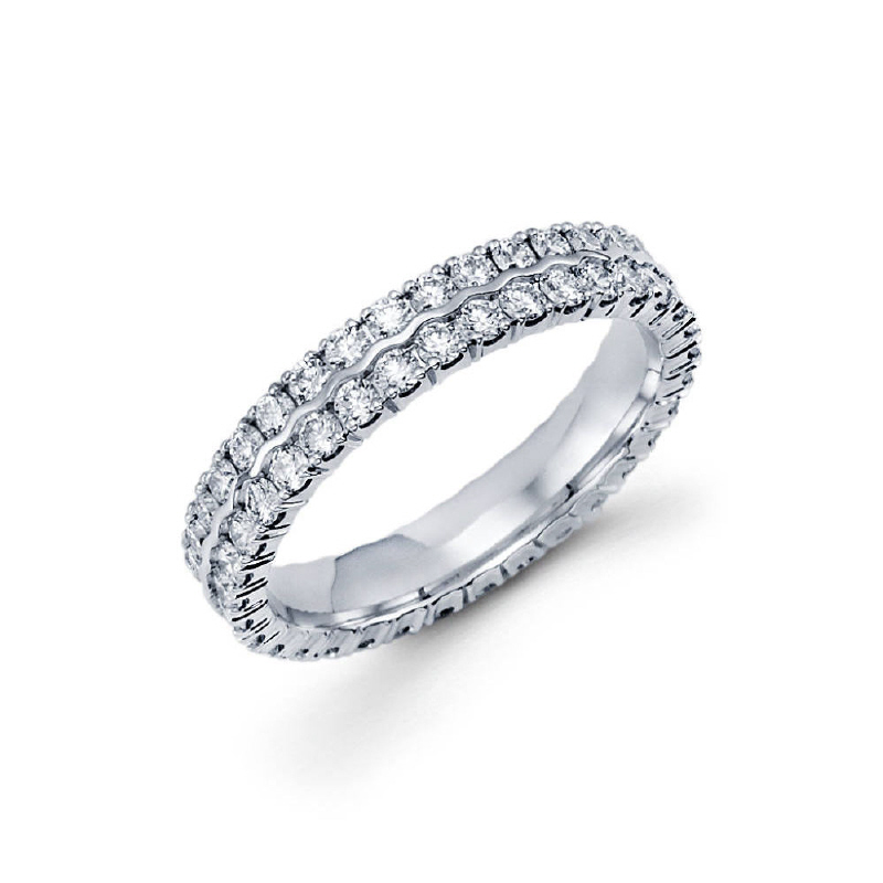 4mm 14k ladie's eternity band features double rows of 34 round ideal-cut diamonds in a prong setting with a curvy finish in between the rows. Total diamond carat weight is approximately 0.68ct.